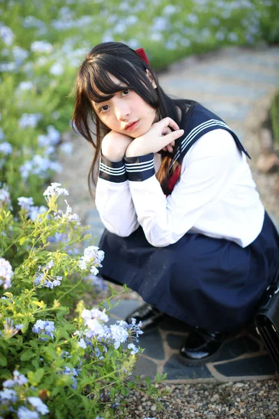 Asian School Girl Sitting Flower Garden Background — Stock Photo, Image
