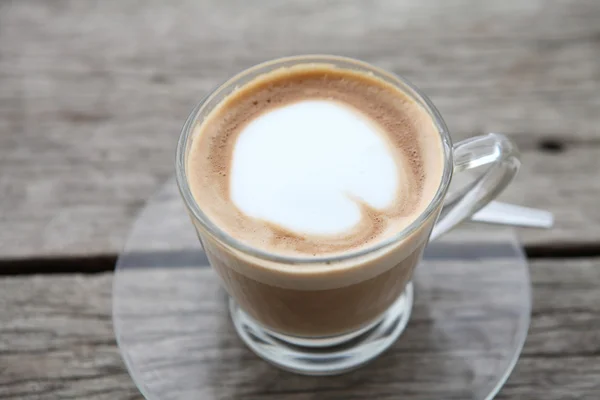 Kaffee auf Holz Hintergrund — Stockfoto