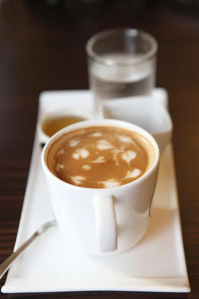 Kaffee auf Holz Hintergrund — Stockfoto
