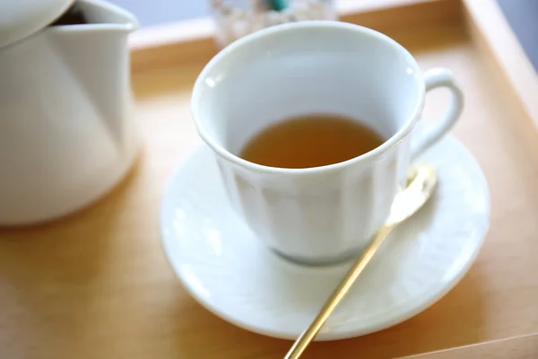 Чайник с чашкой — стоковое фото