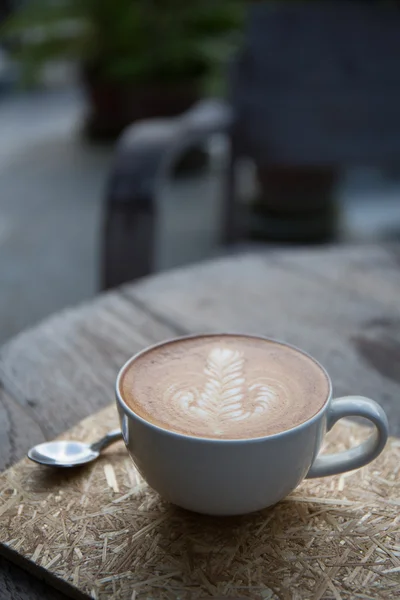 Koffie op hout achtergrond — Stockfoto