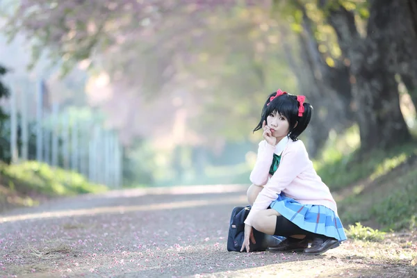 Asian schoolgirl with nature — Stock Photo, Image