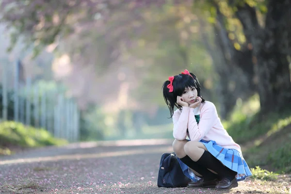 Asian schoolgirl with nature — Stock Photo, Image