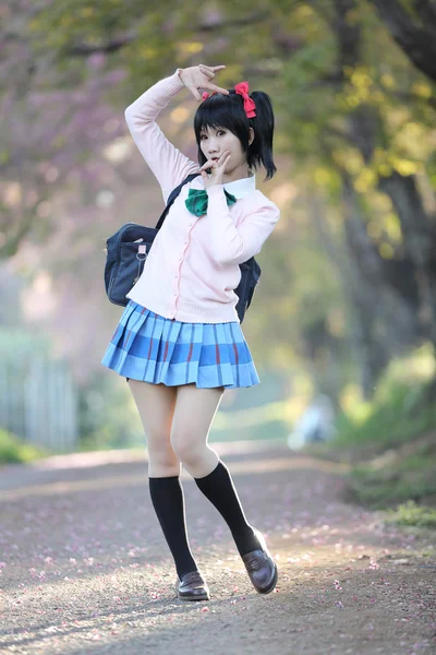 Asian schoolgirl with nature — Stock Photo, Image