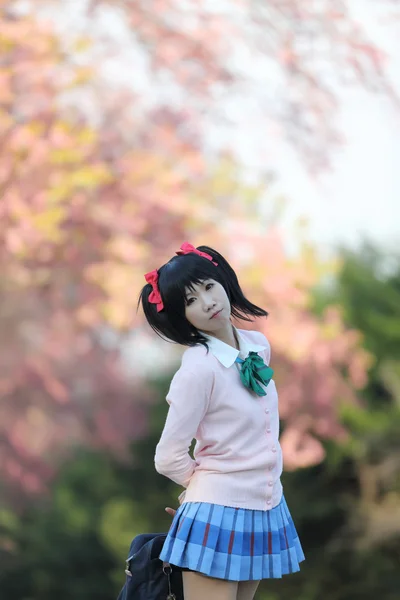 Asian schoolgirl with nature — Stock Photo, Image