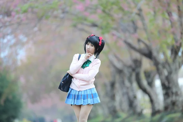 Asian schoolgirl with nature — Stock Photo, Image