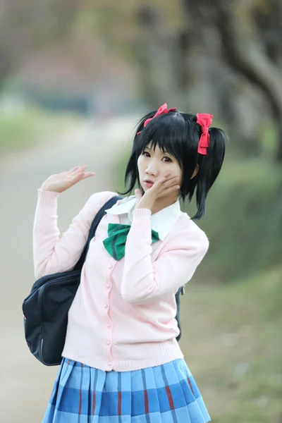 Asian schoolgirl with nature — Stock Photo, Image