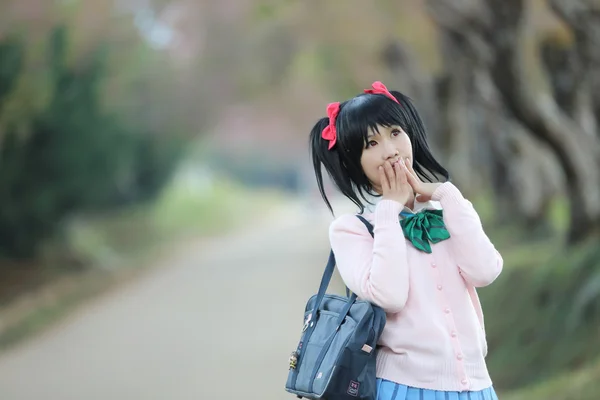 Asian schoolgirl with nature — Stock Photo, Image