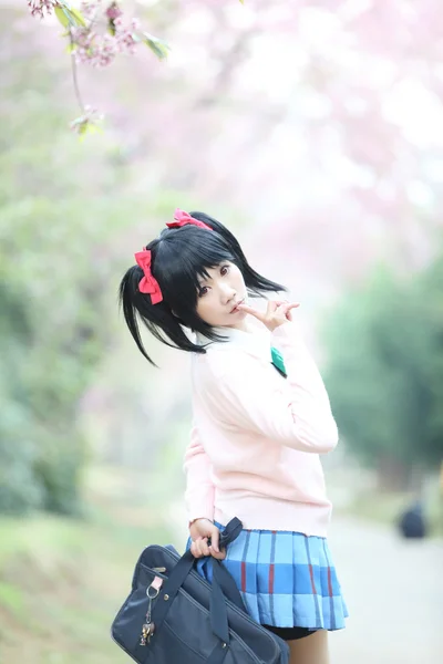 Asian schoolgirl with nature — Stock Photo, Image