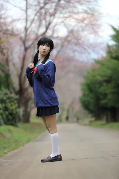 Asian schoolgirl with nature — Stock Photo, Image