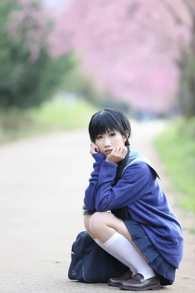 Asian schoolgirl with nature — Stock Photo, Image