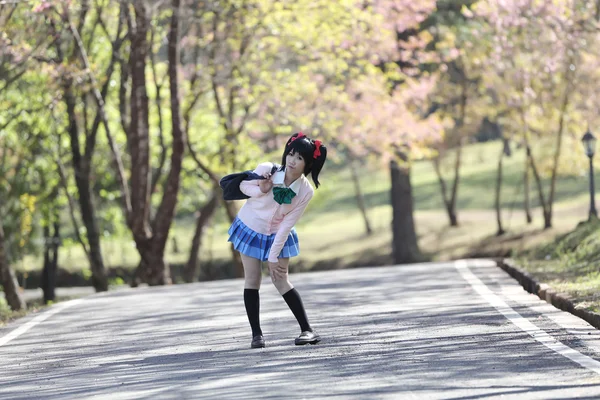 Asian schoolgirl with nature — Stock Photo, Image