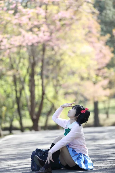 Asian schoolgirl with nature — Stock Photo, Image