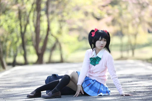 Asian schoolgirl with nature — Stock Photo, Image