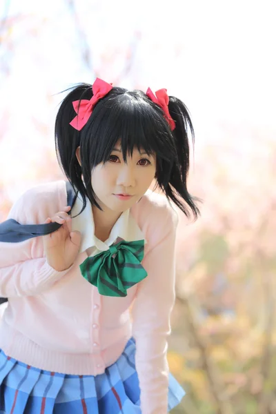 Asian schoolgirl with nature — Stock Photo, Image