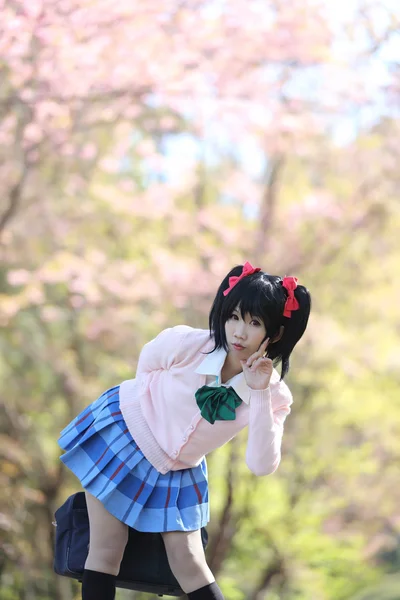Asian schoolgirl with nature — Stock Photo, Image