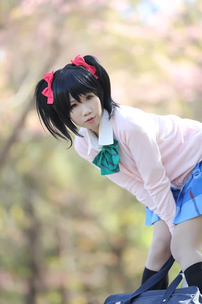 Asian schoolgirl with nature — Stock Photo, Image