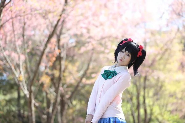 Asian schoolgirl with nature — Stock Photo, Image