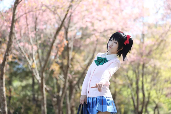 Asian schoolgirl with nature — Stock Photo, Image