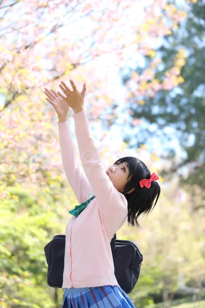 Asian schoolgirl with nature — Stock Photo, Image