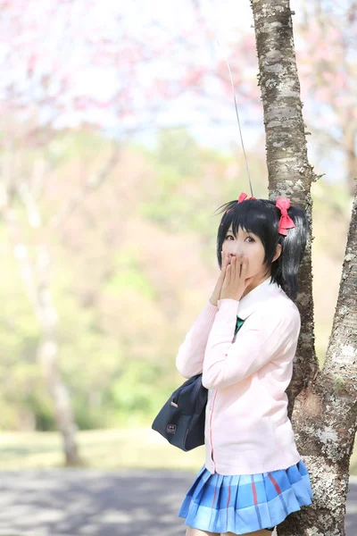 Asian schoolgirl with nature — Stock Photo, Image