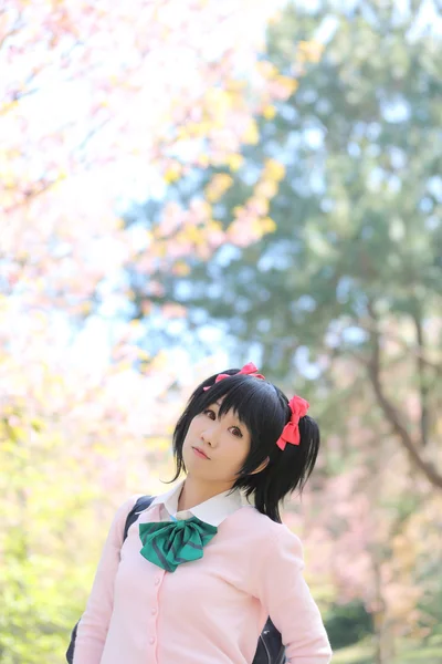 Asian schoolgirl with nature — Stock Photo, Image