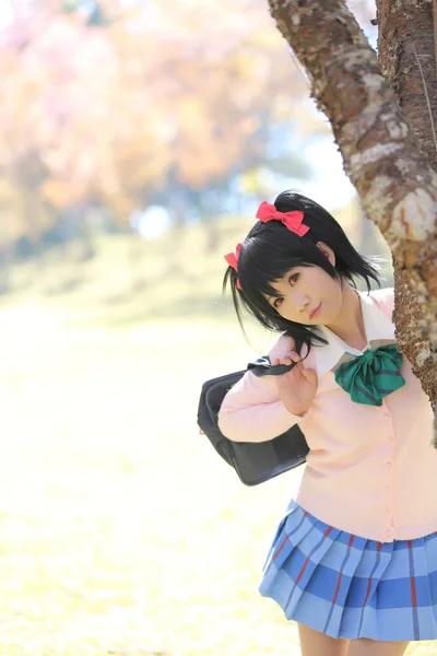 Asian schoolgirl with nature — Stock Photo, Image