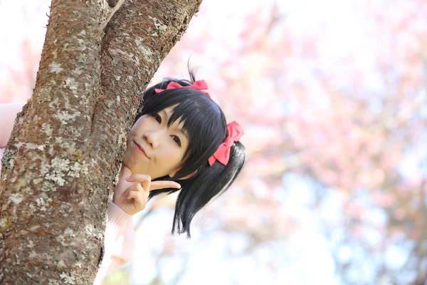 Asian schoolgirl with nature — Stock Photo, Image