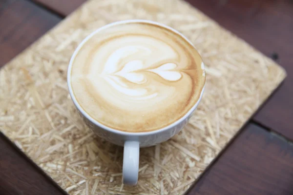 Café sobre fondo de madera —  Fotos de Stock