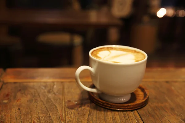 Caffè su fondo legno — Foto Stock