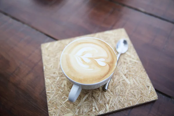 Kaffee auf Holz Hintergrund — Stockfoto