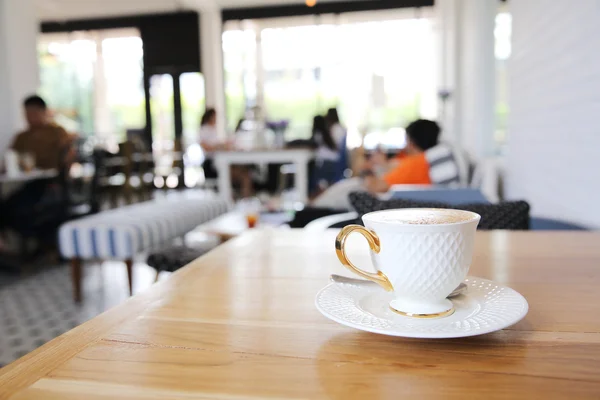 Kaffee auf Holz Hintergrund — Stockfoto