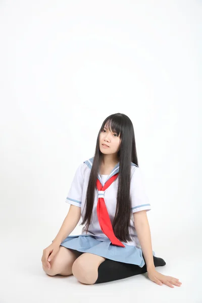 Asian school girl isolated in white background — Stock Photo, Image