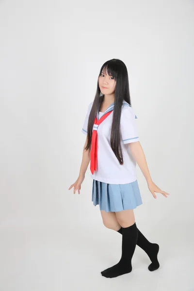 Asian school girl isolated in white background — Stock Photo, Image