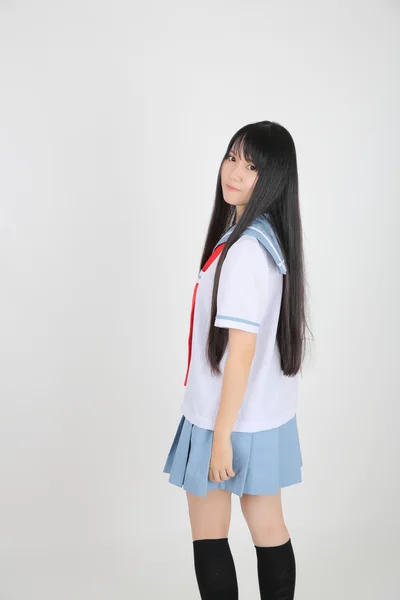 Азиатская школа девочка изолированы в белом фоне — стоковое фото