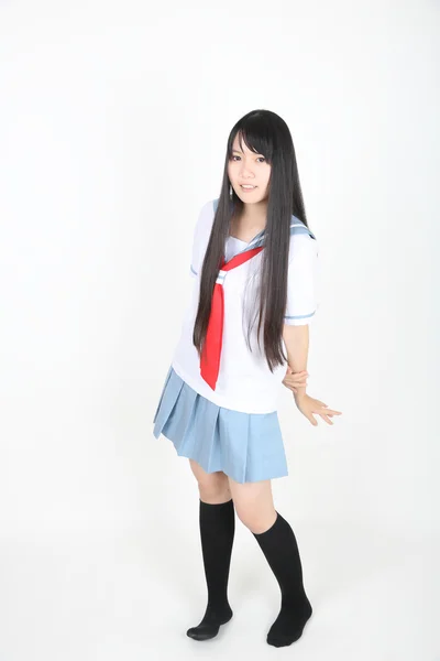 Asian school girl isolated in white background — Stock Photo, Image