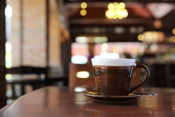 Kaffee auf Holz Hintergrund — Stockfoto