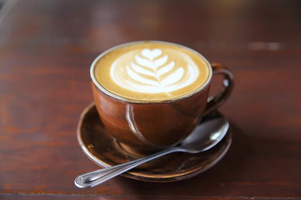 Café sobre fondo de madera — Foto de Stock