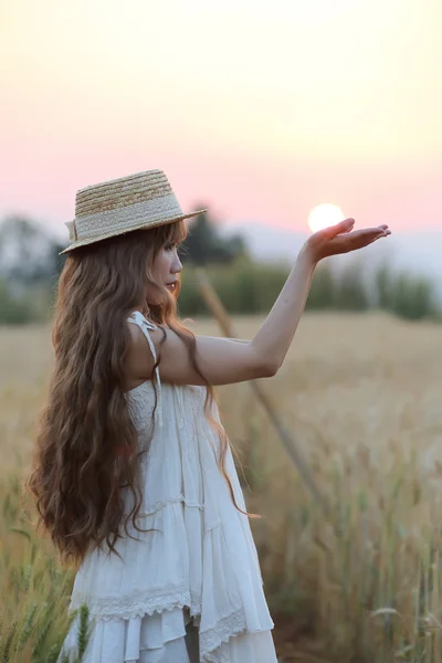 Asian girl on wheat — Stock Photo, Image