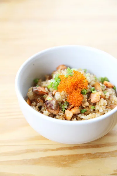 Japanese Salmon fried rice on wood background — Stock Photo, Image