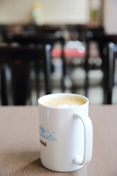 Café sobre fundo de madeira — Fotografia de Stock