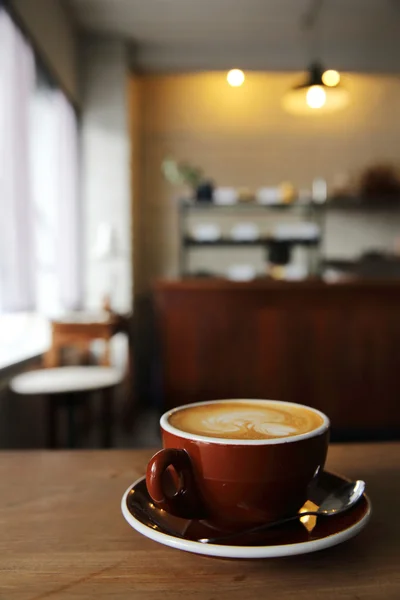 Café sobre fundo de madeira — Fotografia de Stock