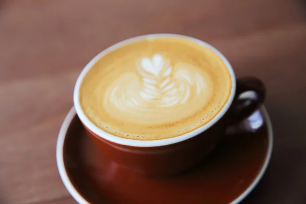 Café sobre fondo de madera — Foto de Stock