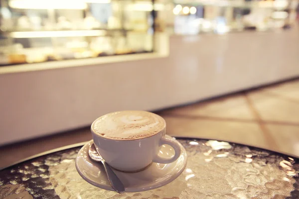 Café sobre fundo de madeira — Fotografia de Stock