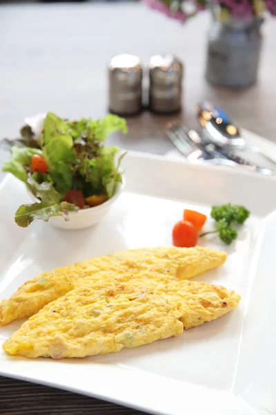 Omelette on wood background — Stock Photo, Image