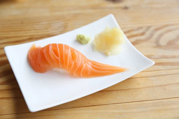 Salmon Sushi on wood background — Stock Photo, Image