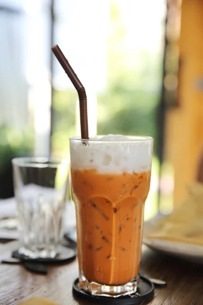 Local Thai Ice tea on wood background — Stock Photo, Image