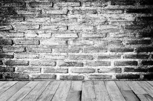 Brick wall and wooden floor