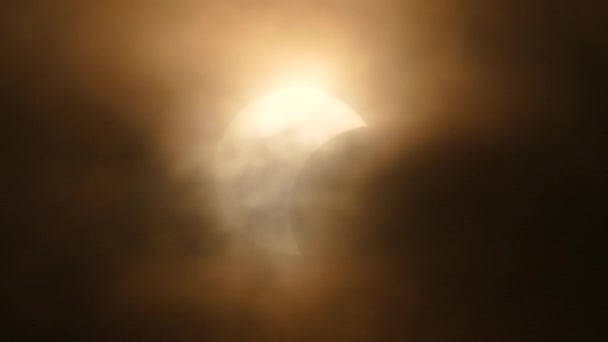 The Moon covering the Sun of partial eclipse, astronomical phenomenon. — Stock Video