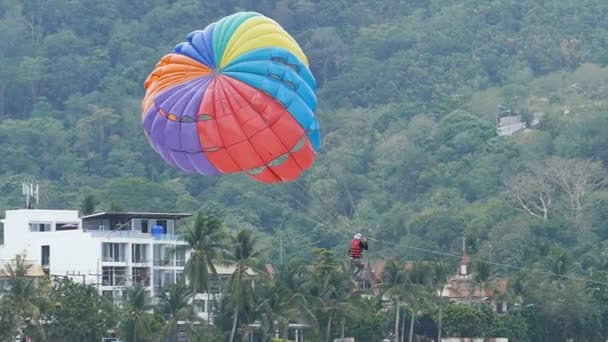 A parachute being towed at sea. — Stock Video